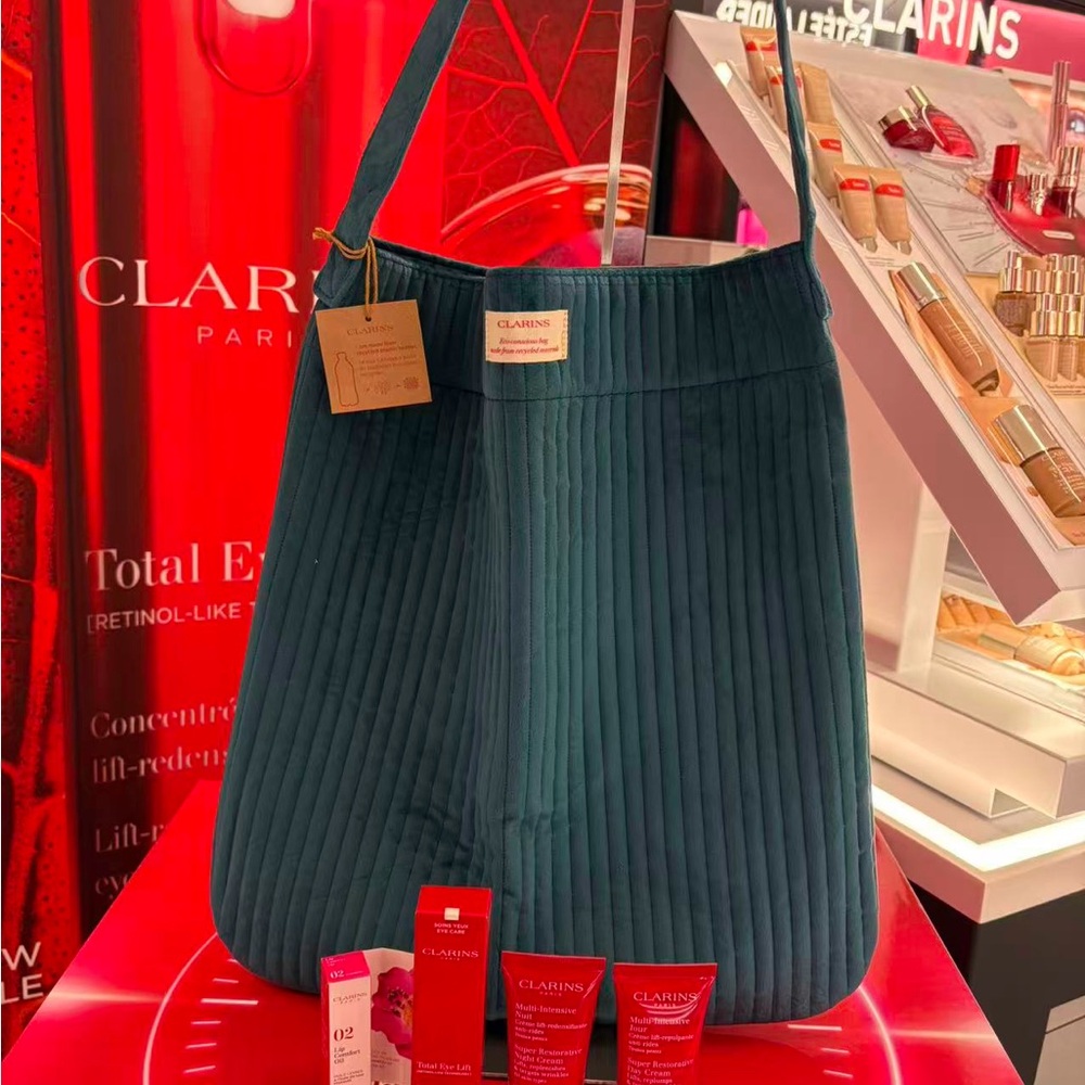 Clarins skin care set and bag